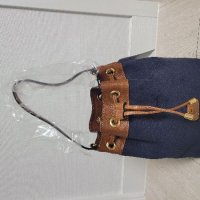 review of ma.FINESSE STRING BUCKET BAG