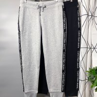 캘빈클라인 여성 로고테이프 플리스 트레이닝 팬츠 2색 Calvin Klein Jeans Logo Tape Fleece Jogger Pants CJRP3162