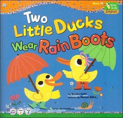 Two little ducks wear rain boots