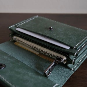 므네메  월렛, 허던