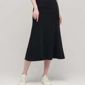 [무신사 스탠다드 우먼] 우먼즈 세미 머메이드 스커트 [블랙] MWBKS202-BK