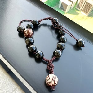 옵시디언 페다라수 연꽃 차량용 단주, 수진