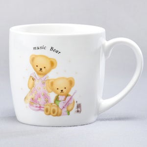 홍보아이템국산 뮤직베어 머그320ml제작업체