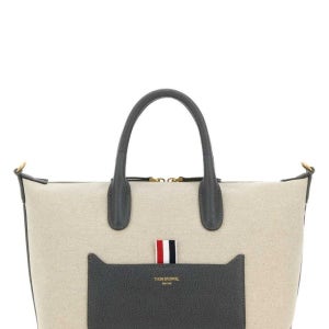 톰브라운 남성 베이지 토트백 UAG164A F0492 255 UAG164AF0492 여성 쇼퍼백 탑핸들백 핸드백 Sand canvas Duffle small ha 144243818