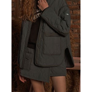 [씨엔엔 어패럴]  트래블 여성용 이지 웨이브 퀄티드 패딩 팬츠 스커트 딥카키_CA23TSK455DKA