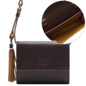 미우미우 25FW 여성 로고 스트랩 반지갑 (5MT024 2IDW F04MV 25F)