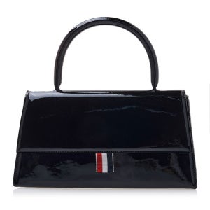 톰브라운 블랙 핸들백 UAG054A L0020 001 여성 페이턴트 트래피즈 토트백 76415787