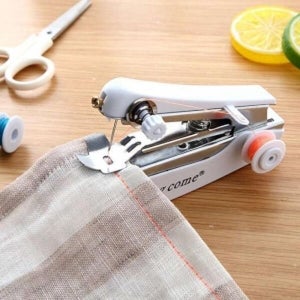 케이티알파쇼핑 쏘잉 휴대용 핸드미싱 수동 손 바느질 미니재봉틀