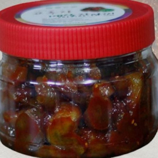 Traditional Handmade Plum Jangajji (Pickled Plum) with Spicy Gochujang as a Side Dish