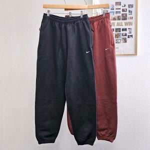 나이키 팬츠 솔로 스우시 기모 플리스 커프드 긴바지 US 루즈핏 겨울