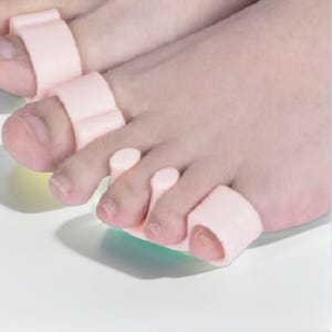 새끼 발가락 휨 소건막류 소지내반증 발가락 고정기