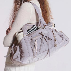 (국내매장판) 뉴발란스 글로시 리본 더플백 NBGCFSW105