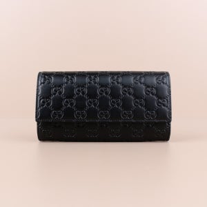 구찌 시그니처 플랩 여성 장지갑 블랙 779785 CWC1G 1000