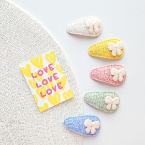 이쁜씨네 솜사탕 니트 리본 똑딱핀